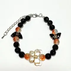 【ハンドメイド】蝶モチーフビーズブレスレット ブラック/オレンジ