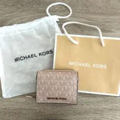 MICHAEL KORS 三つ折り財布 ピンク系 MK柄のサムネイル