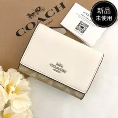 新品未使用コーチ二つ折り財布ホワイトレザーレディースメンズ送料無料