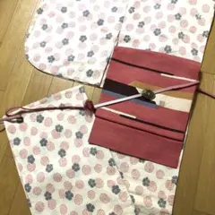 ヴィンテージ￼ 麻　単衣　小紋　赤いぐるぐる渦巻きに撫子