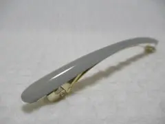 細いアクリル系付き　ゴールドバレッタ　グレー系