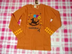 chocola　140ｃｍ新品長袖Ｔシャツ　オレンジ地に木馬柄　本体綿100％