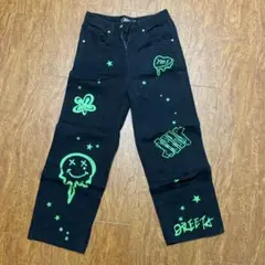 .KOM グラフィティプリント デニムパンツ 34