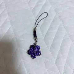 紫色花形ストラップ