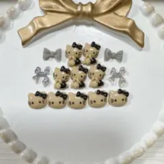 キティちゃん 日焼け黒 ネイルパーツ デコパーツ 10個セット(パーツおまけ)