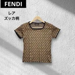 良品✨FENDI ズッカ×ペカン切替ポロシャツ ロゴボタン 茶系 42 FENDI - 良品✨FENDI ズッカ×ペカン切替ポロシャツ ロゴボタン 茶系 42