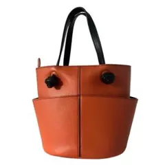 トッズ　バケツ型　ハンドバッグ　バケット　レザー　タッセルディティール　オレンジ