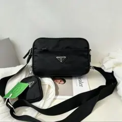 PRADA ブラック ノベルティーショルダーバッグ 美品 PRADA ノベルティ ショルダーバッグ 4t - メルカリ