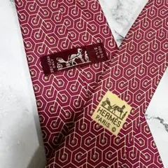 エルメス HERMES ネクタイ レッド系 総柄 幾何学模様