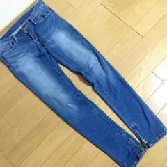 ブラックバイマウジー裾ジッパースキニー