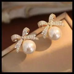 リボン パール ピアス ラインストーン 上品 エレガント レディース きれいめ