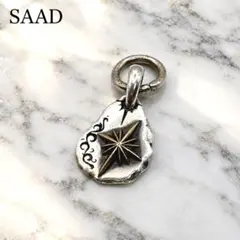 SAAD ネックレス 太陽神 sv925 唐草 叩き サンシンボル - メルカリ