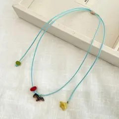 動物モチーフ ネックレス 水色 ダックスフンド 小犬 フラワー カラフル