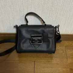 COACH ペッパーサッチェル ハンドバッグ シグネチャー ストラップ無し