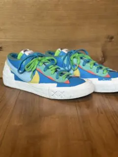 KAWS × sacai × Nike Blazer Low