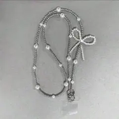 シルバーパールスマホジョルダー　リボン　ホワイトパール