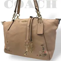 良品　コーチ　2way ショルダーバッグ　ハンド　レザー　花柄　ピンクベージュ