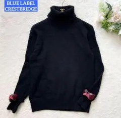 【ブルーレーベルクレストブリッジ】カシミヤ混タートルネックセーター リボン