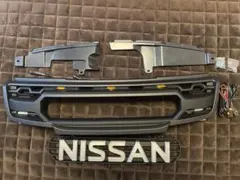 新品未使用 エクストレイルt31後期 タコマ風グリル マーカー付き