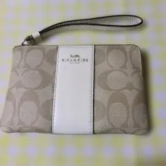 COACH ベージュ ポーチ ハンドストラップ付き
