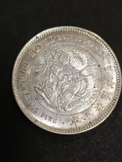 明治10年貿易銀、銀製参考品、目方27,7g、 比重10.01、pL未使用 美品銀貨 /貿易銀 • 明治十年発行(古銭 )