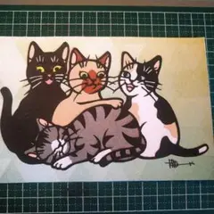 ４匹の猫の切り絵(猫百態)