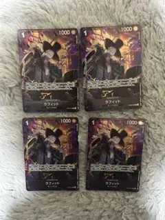 ワンピースカード ラフィット 4枚セット パラレル - メルカリ