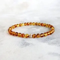 アンバー(琥珀)タンブル 1連 ニューホック ブレスレット - メルカリ
