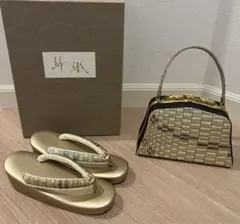 16万円早い勝ち新品キンワシ黒地金銀模様クラッチバッグと本舗草履 