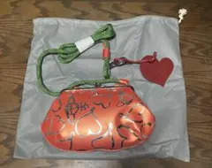 ショルダーバッグ　クラッチバッグ　オレンジ　橙　朱色　ハート柄