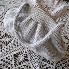 ビーズ編みライトブルーの がま口Clutchバッグ　　　ハンドメイド　即発送