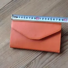 Tripping clutch三つ折り 財布 オレンジのサムネイル