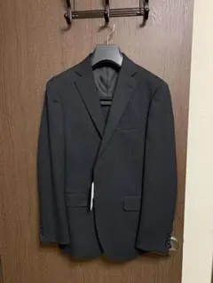 A4新品未使用！お勧め品！裾上げ済み！ブラックスーツ！ウォッシャブル！極小訳のみ