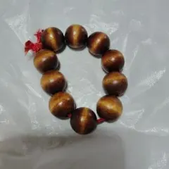 木製ビーズ 茶色 2センチ大きさ　穴２個３ミリ〜４ミリ　10個