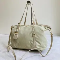 美品✨プラダ　2wayトートバッグ　金具ロゴ　白タグ　ギャランティカード付き