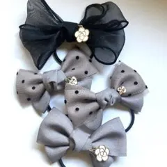 ヘアゴム リボングログランランダム4点セット　モノトーンカメリアチャーム付56.