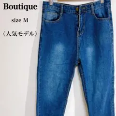 カットオフ仕様 ブルー系 デニムパンツ 裾刺繍ロゴ入りのサムネイル