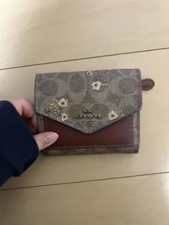 COACH 花柄 二つ折り財布 ブラウン系
