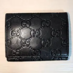 332 GUCCI グッチ 二つ折り財布 GG ゴールドロゴプレート Wホック