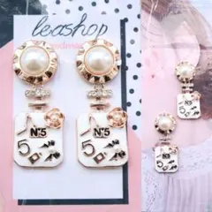 ゴールド No.5 カメリアリボン 香水瓶 おおぶり ピアス シャネルストーン可