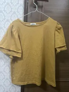 マスタード トップス レディース