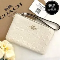 新品　正規品☆COACH コーチ　ポーチ　 ホワイト　エンボス ポーチ
