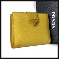 PRADA 二つ折り サフィアーノ イエロー - メルカリ