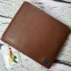 ポーター✨カレント 本革 牛ステア レザー ロゴプレート 二つ折り財布 ブラウンのサムネイル