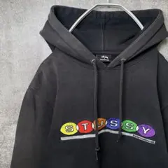 STUSSY パーカー M 黒 カラフルロゴ刺繍 ユニセックス 良フェード