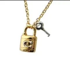 COACH 南京錠ネックレス鍵のデザインネックレス
