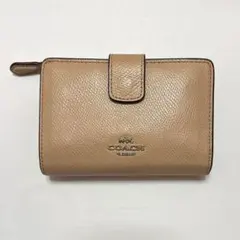 COACH二つ折り財布　ベージュ