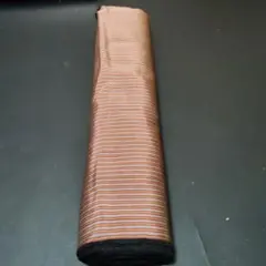 茶色とオレンジのストライプ布地