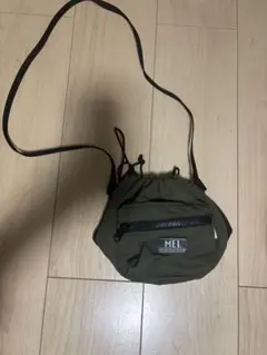 MEI オリーブ ドローストリング サコッシュ