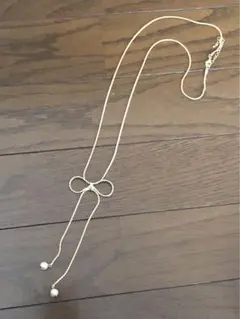 リボンモチーフ ネックレス パールチャーム付き ゴールドカラー